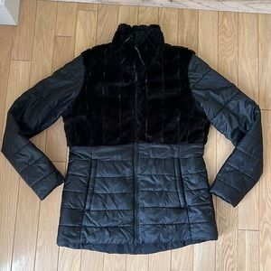North Face REVERSIBLE black winter jacket. Detailing includes faux fur.